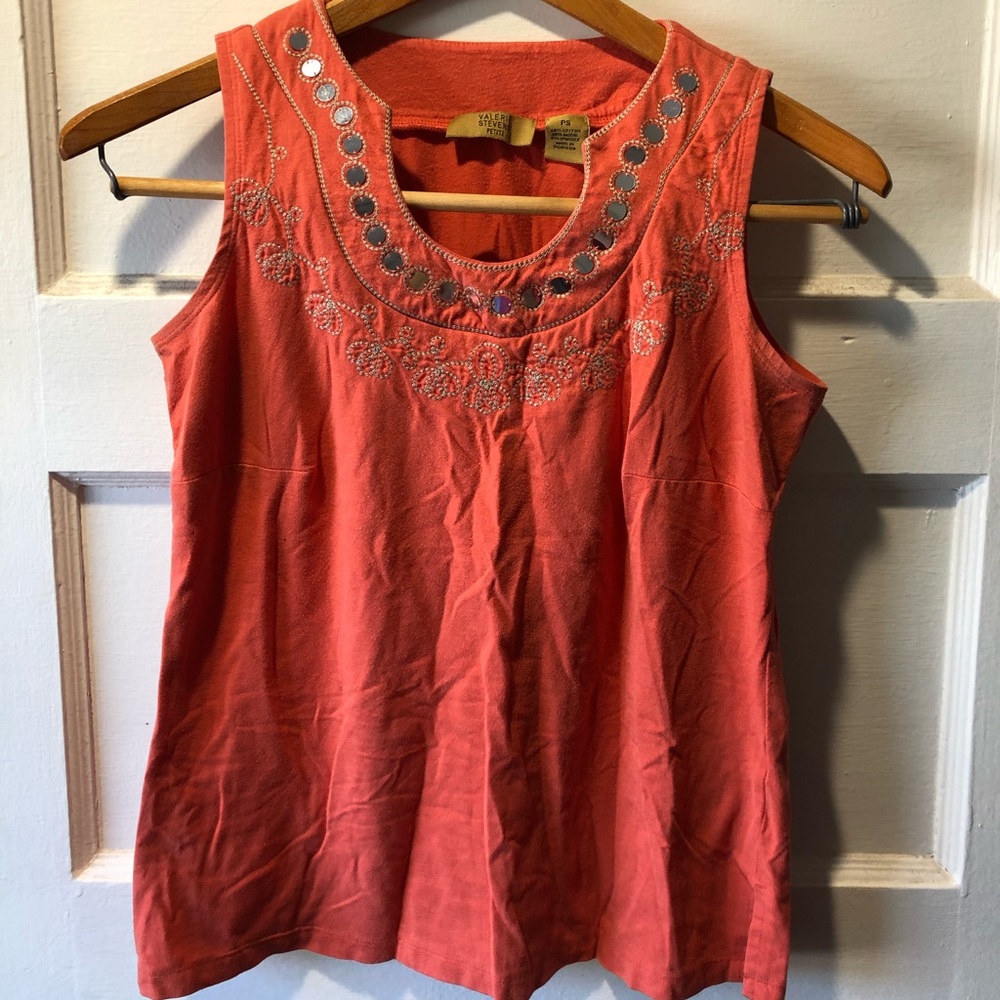 Sleeveless orange blouse